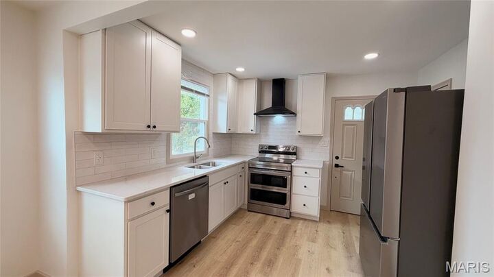 Property Photo:  1321 Weleba Avenue  MO 63121 