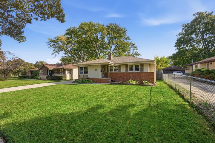 Property Photo: 8725 W Palmetto Ave WI 53225