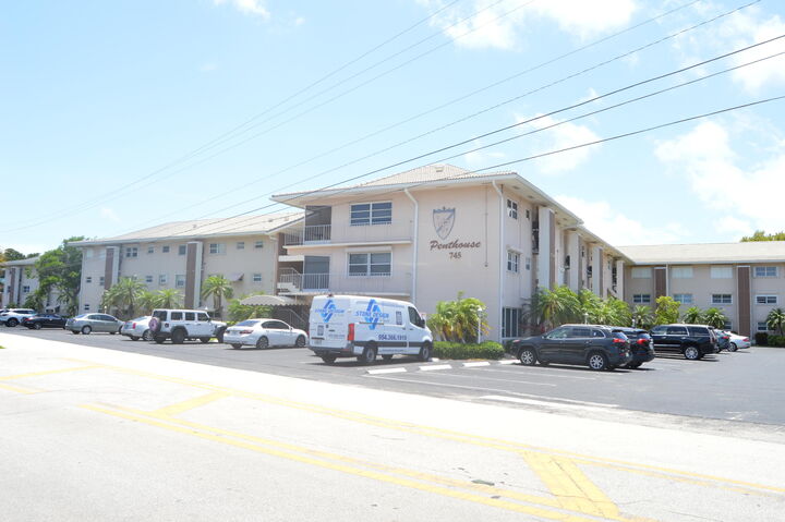 Property Photo:  745 SE 19th Avenue 120  FL 33441 