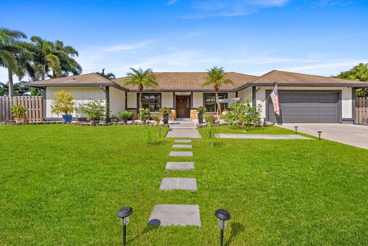 Property Photo:  6515 Riparian Road  FL 33462 