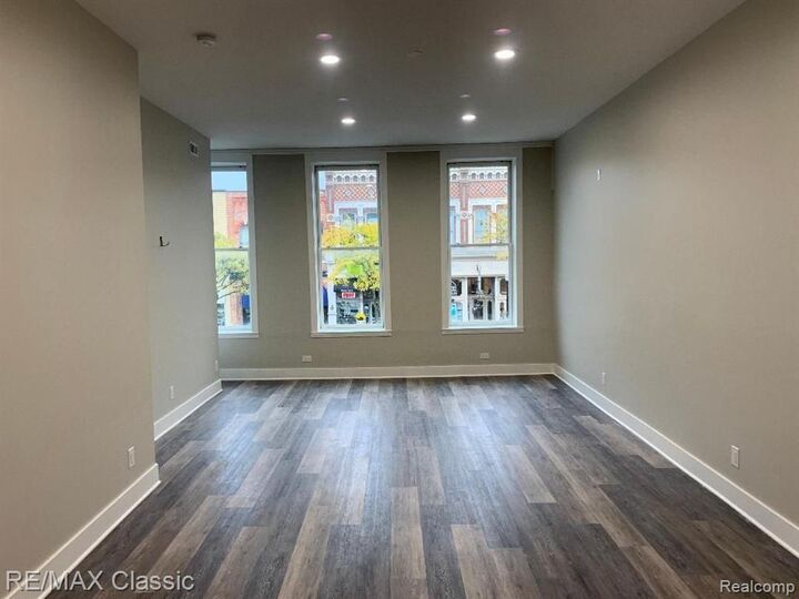 Property Photo:  109 - 2 W Grand River Avenue  MI 48843 