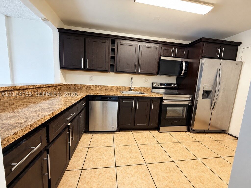 Property Photo:  1465 NE 123rd St 205  FL 33161 