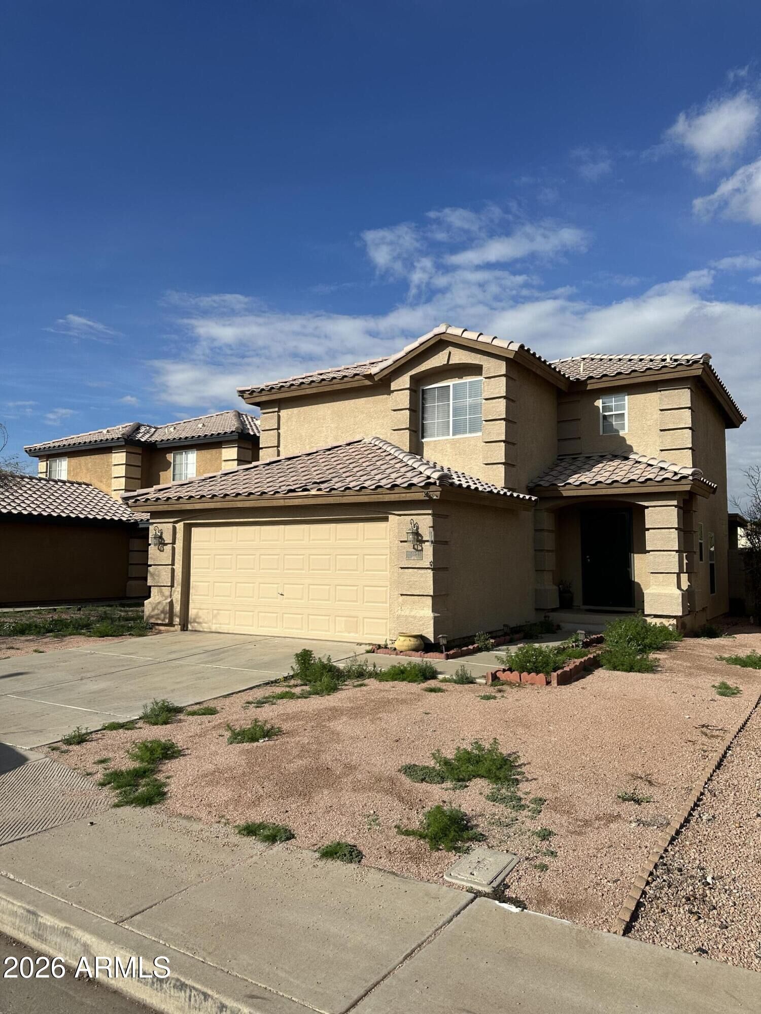 Property Photo: 11930 W Larkspur Road AZ 85335
