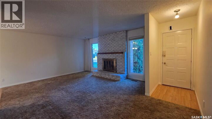 Property Photo: 9012 Mitchell Crescent SK S9A 3J7