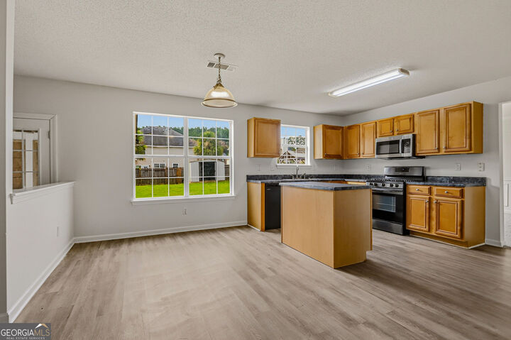 Property Photo:  235 Hillside Oak Lane  GA 30016 
