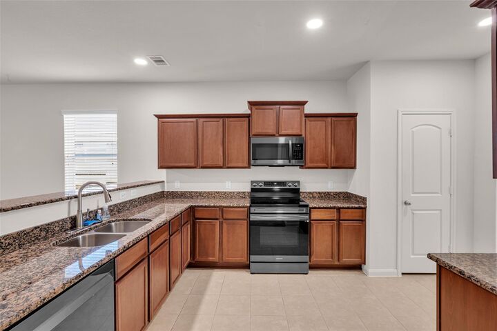 Property Photo:  22426 Base Light Drive  TX 77447 