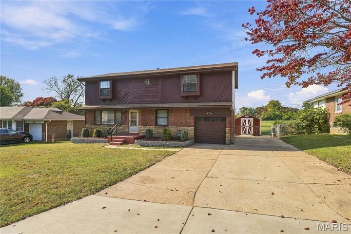 Property Photo:  9719 Durham Drive  MO 63137 