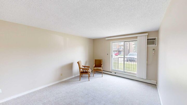 Property Photo:  405 Columbia Boulevard W 107  AB T1K 5R8 