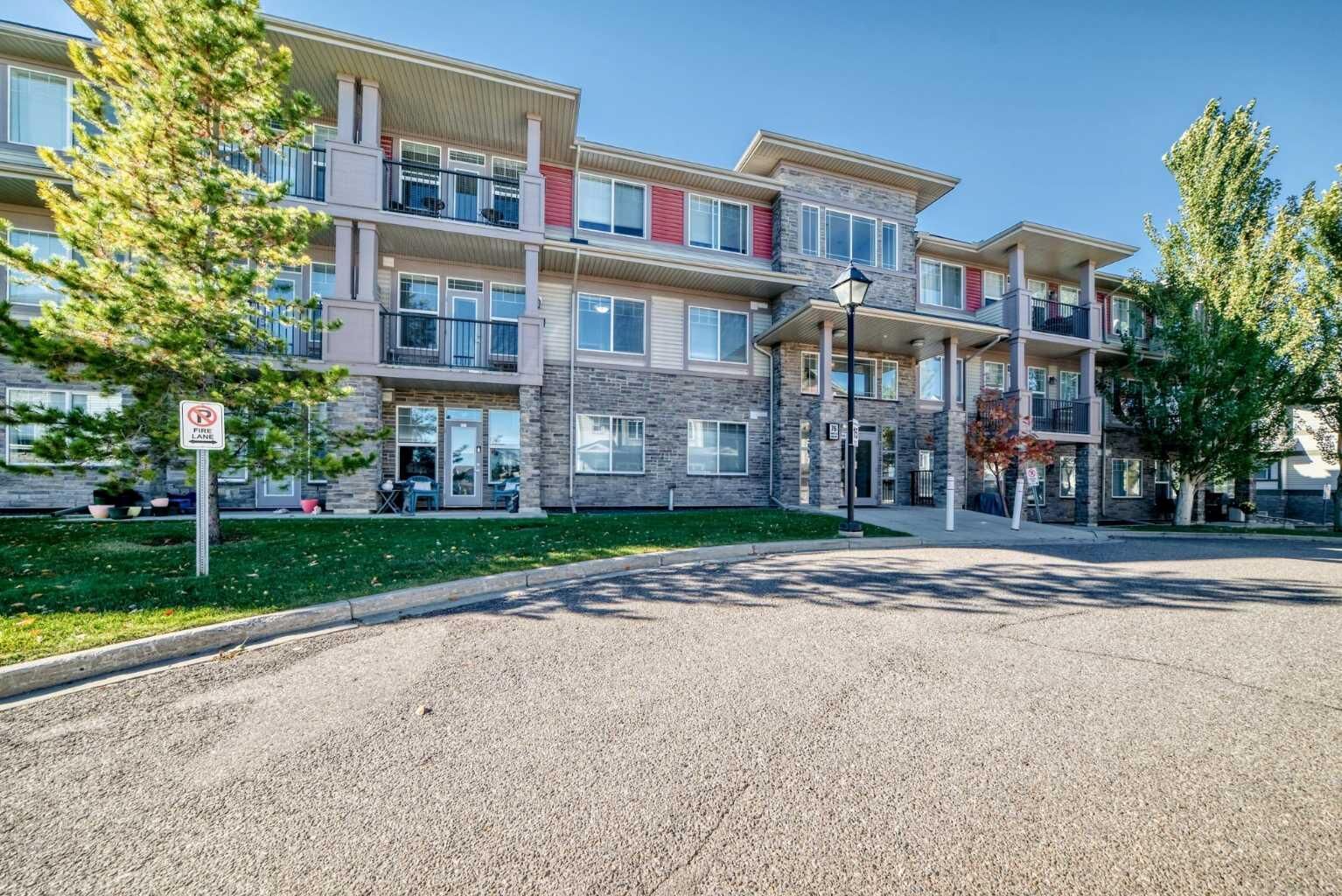Property Photo:  76 Panatella Road NW 106  AB T3K 0V4 