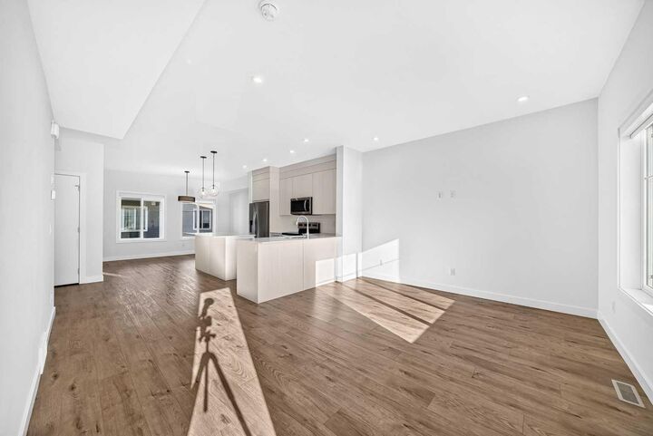 Property Photo:  6 Merganser Drive W 303  AB T1X 2Y2 