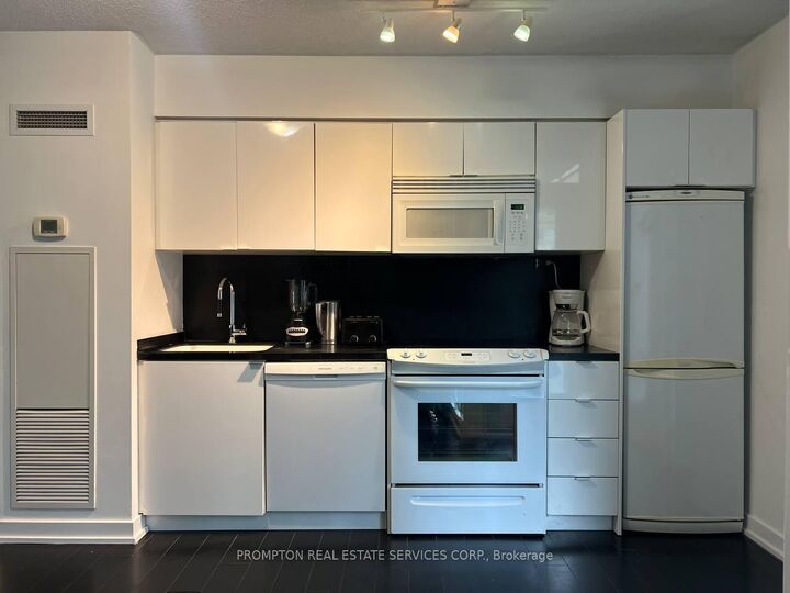 Property Photo: 15 Iceboat Terrace 731 ON M5V 4A5