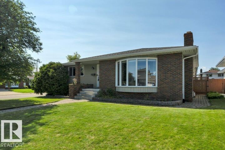 Property Photo:  6960 21 Av NW  AB T6K 2H4 