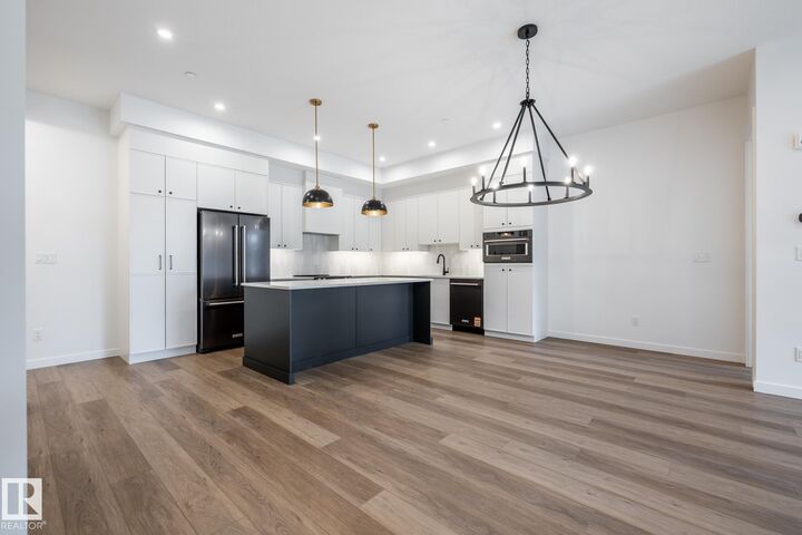 Property Photo:  7459 May Common NW 104  AB T6R 0X6 