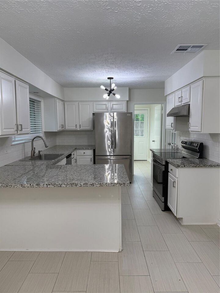 Property Photo: 2318 Aprilmont Drive TX 77498