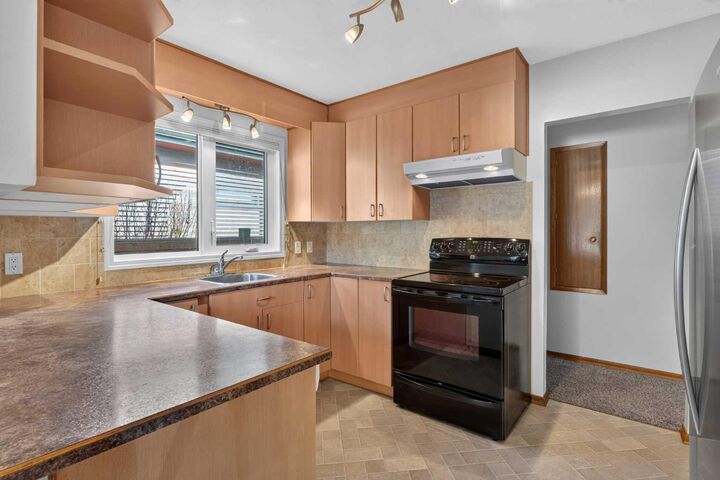 Property Photo:  4536 Claret Street NW  AB T2L 1C1 