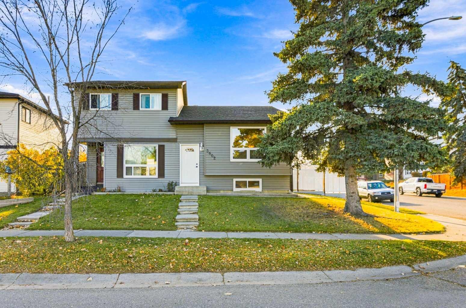 Property Photo: 3602 Cedarille Drive SW AB T2W 5B2