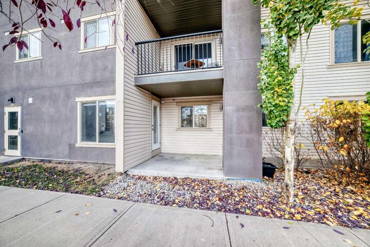 Property Photo:  403 Mackenzie Way SW 4118  AB T4B 3V7 