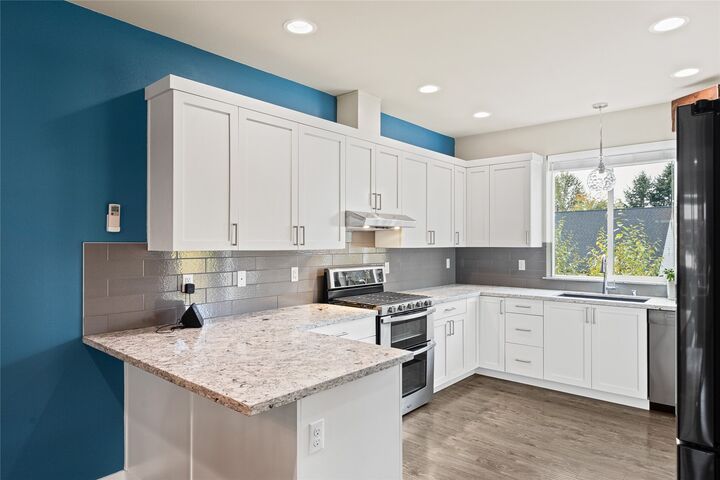Property Photo:  12718  35th Avenue SE G-3  WA 98208 