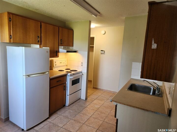 Property Photo:  245 3rd Street NE  SK S0A 4J0 