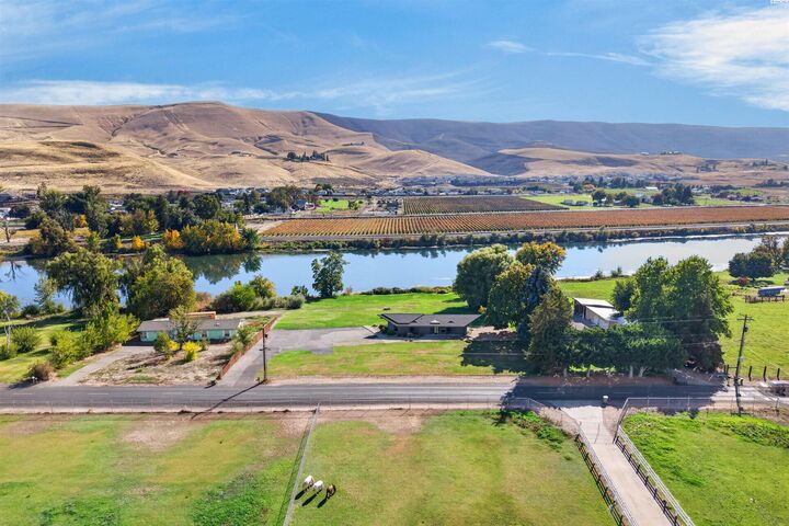 Property Photo:  142103 W North River Road  WA 99350 
