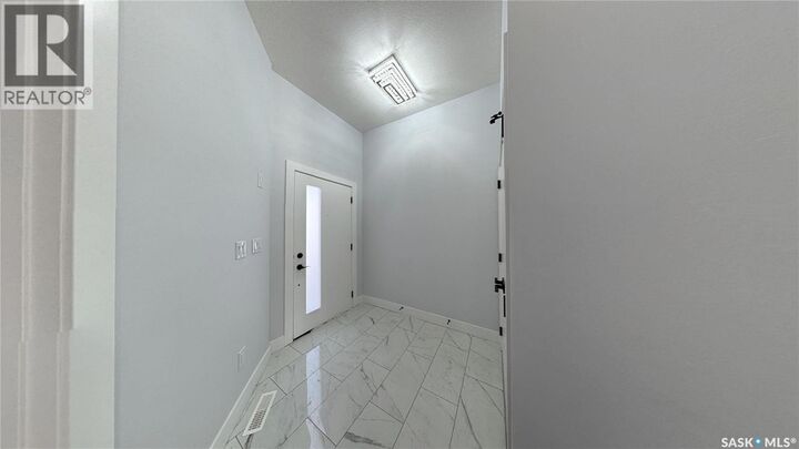 Property Photo:  715 Nazarali Union  SK S7V 1X4 