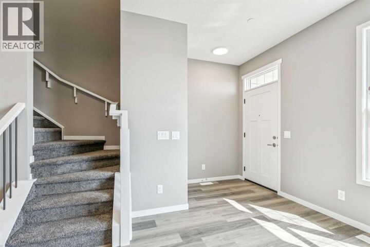 Property Photo:  205 Hotchkiss Road Southeast  AB T3S 0T9 