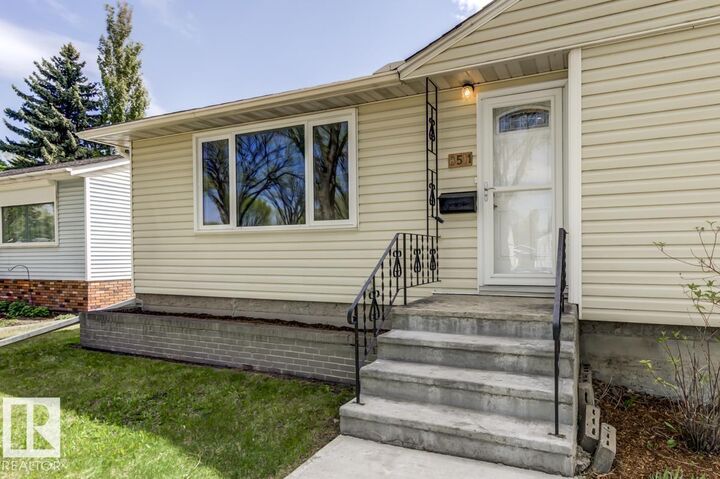 Property Photo:  8511 64 Avenue NW  AB T6E 0H1 