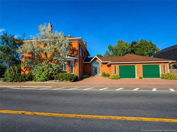 Property Photo:  102 St George  NB E2A 1B5 