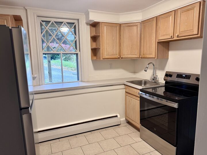 Property Photo: 65-R Pleasant St 1 MA 01945
