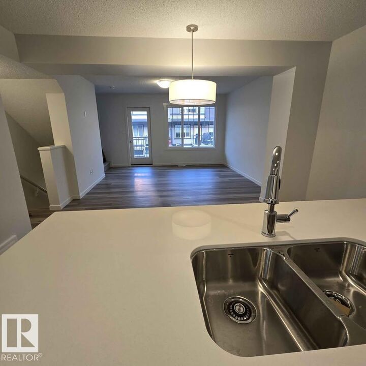 Property Photo:  1530 Tamarack Blvd NW NW 135  AB T6T 2E6 