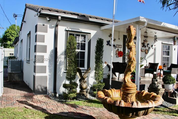 Property Photo:  1971 NW 36th Ave  FL 33125 