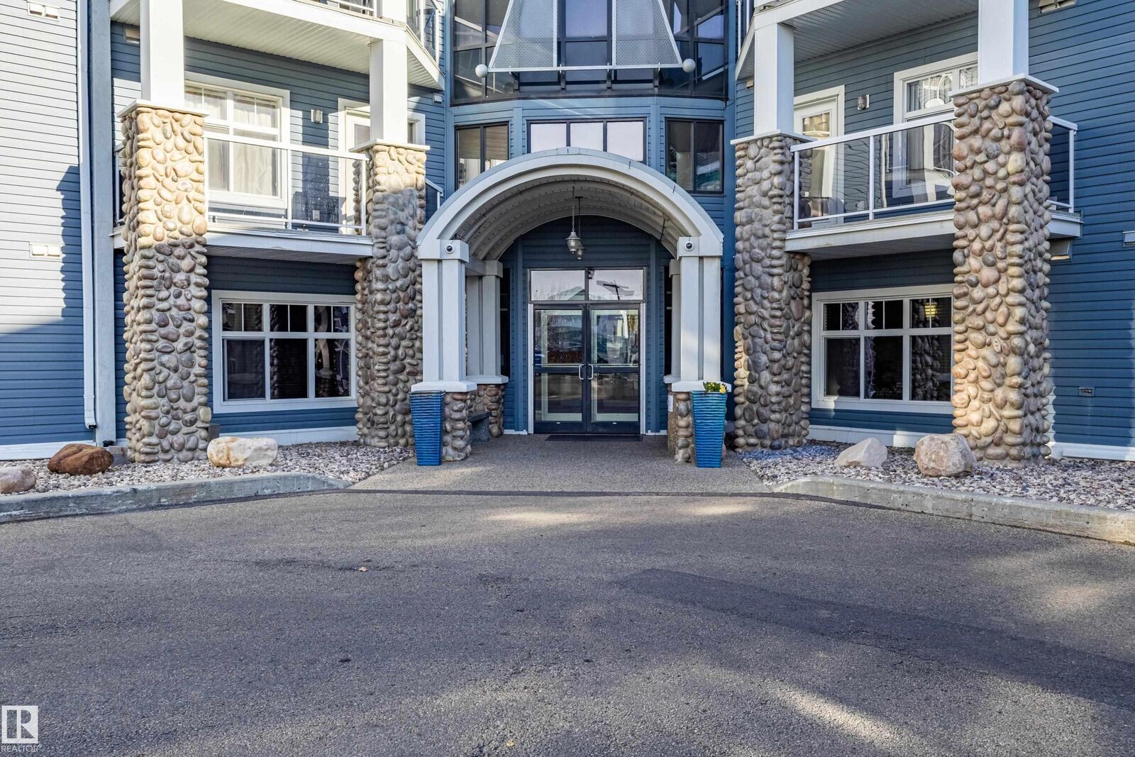 Property Photo: 16035 132 Street NW 328 AB T6V 0B4
