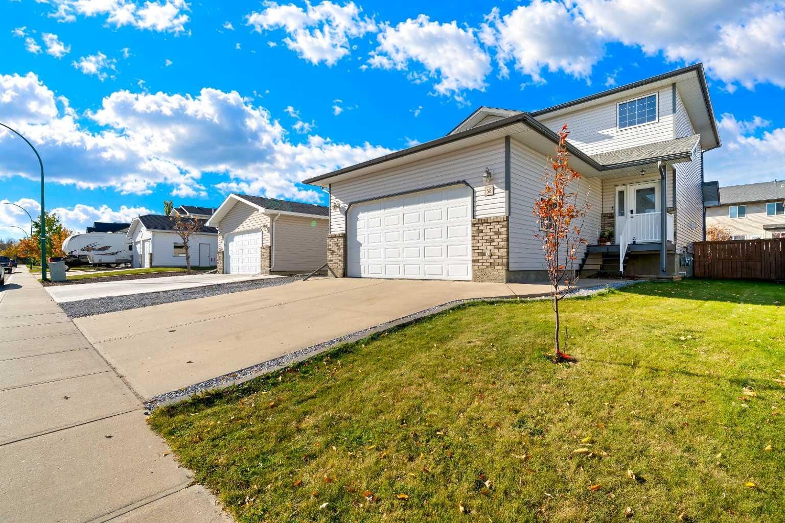 Property Photo: 38 Sunrise Road SW AB T1B 4P2