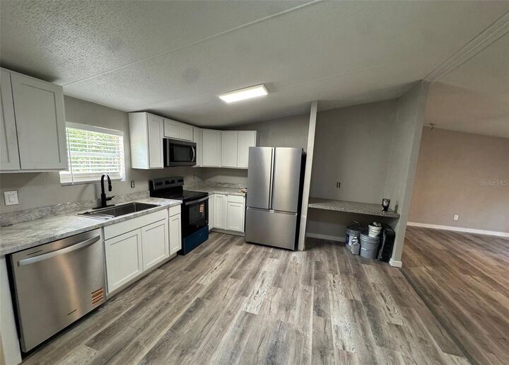Property Photo:  7420 NE 111th Place  FL 32609 