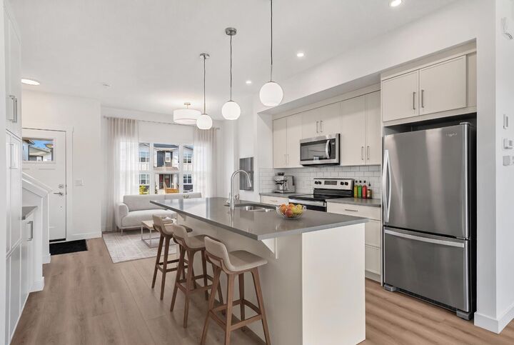 Property Photo: 525 River Heights Drive 1505 AB T4C 3E4