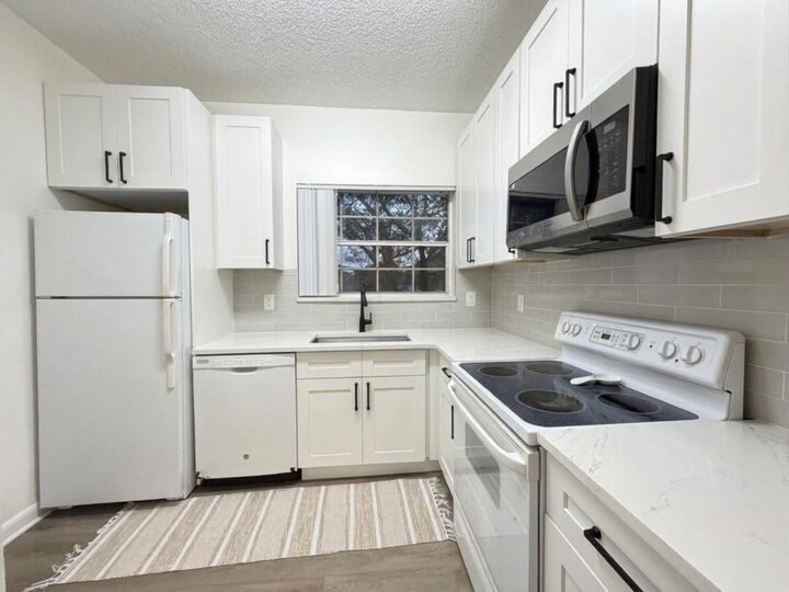 Property Photo:  651 Cypress Lake Boulevard L  FL 33064 