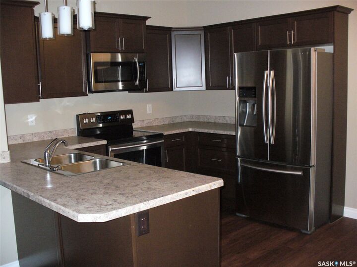 Property Photo: 3630 Haughton Road E 410 SK S4V 1P1