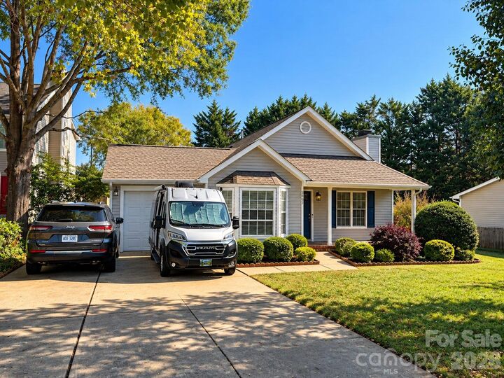 Property Photo:  3663 Canopy Oak Court  NC 27265 