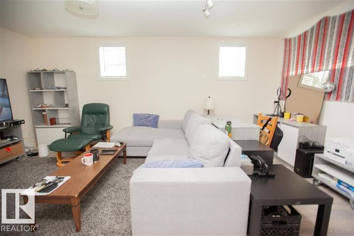 Property Photo:  11403 83 Street NW Bsmt  AB T5B 2Y4 