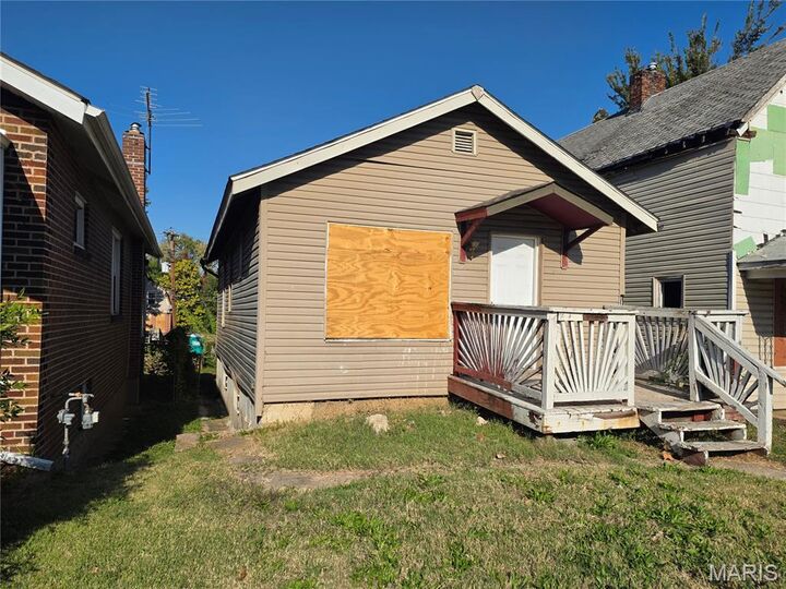 Property Photo:  5917 Harney Avenue  MO 63136 