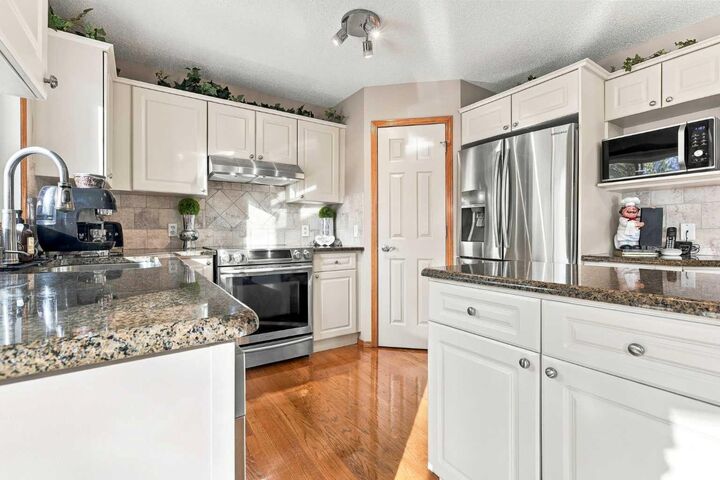 Property Photo:  134 Arbour Ridge Close NW  AB T3G 4B2 