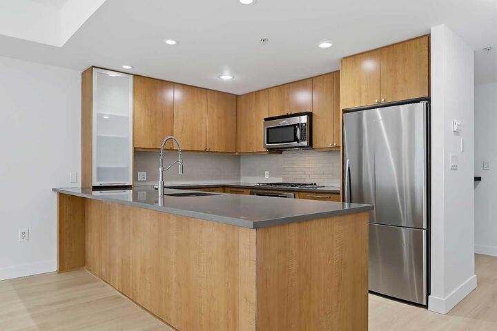 Property Photo:  1118 12 Avenue SW 305  AB T2R 0P4 