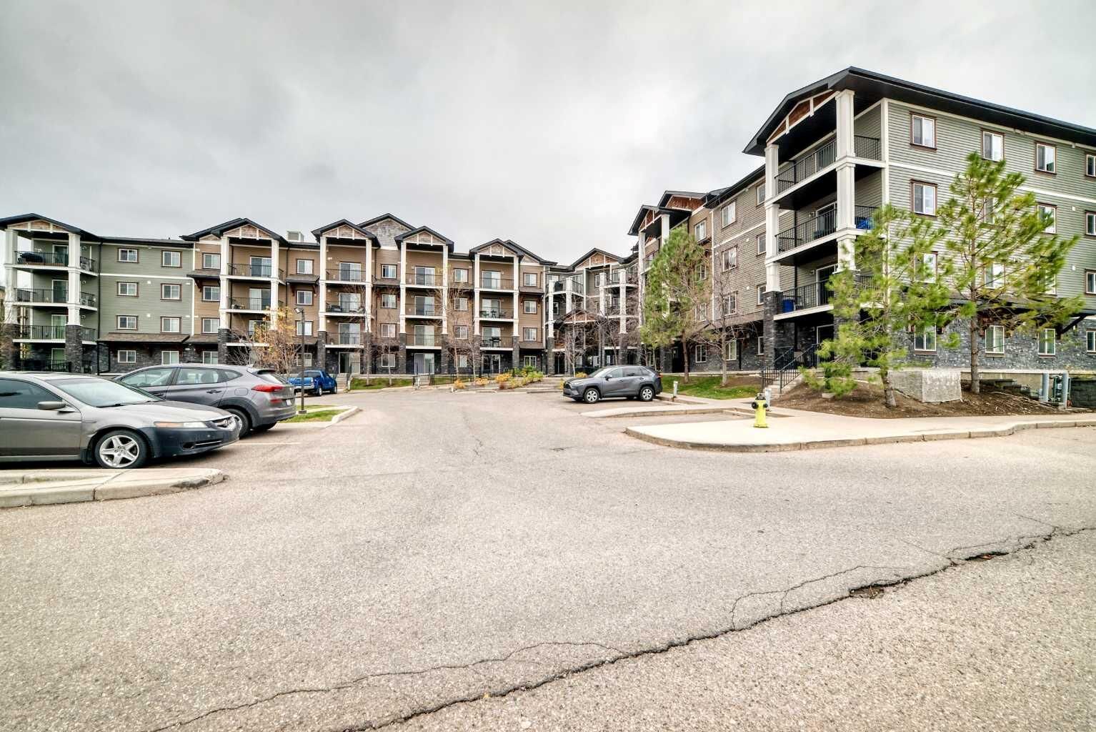 Property Photo:  130 Panatella Street NW 1305  AB T3K 0Y6 