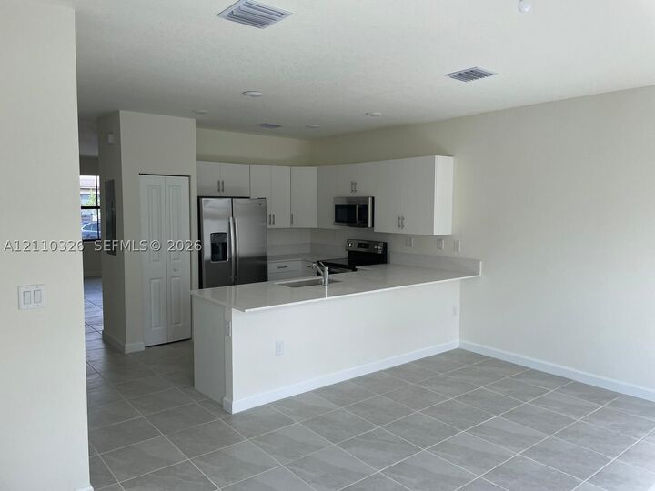 Property Photo: 11407 W 34th Ct FL 33018