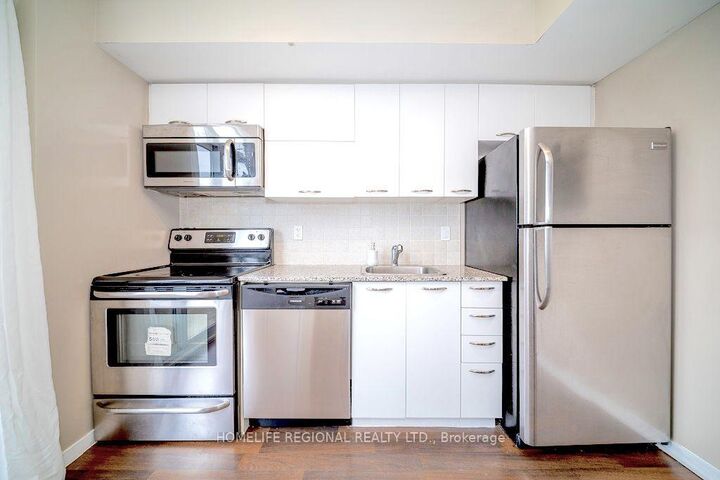 Property Photo: 38 Joe Shuster Way 1520 ON M6K 0A5