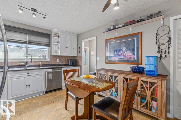 Property Photo:  11827 140 Avenue NW  AB T5X 4J7 
