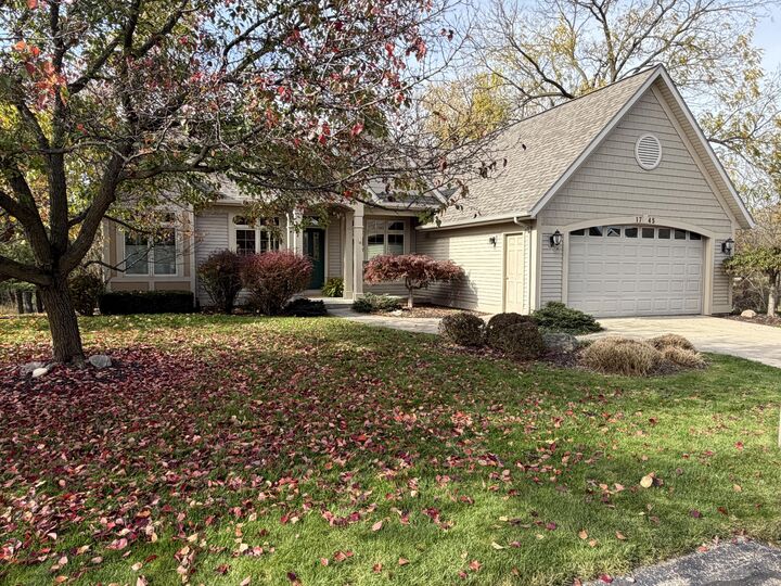Property Photo:  1745 Oakleigh Woods Drive NW  MI 49504 