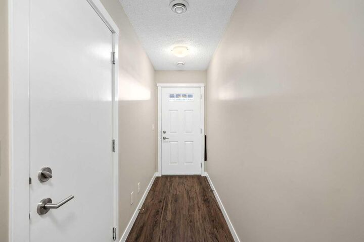 Property Photo:  428 Nolan Hill Drive NW 407  AB T3R 0V4 