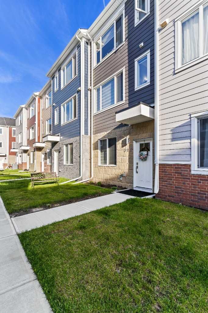Property Photo:  11428 52 Street NE 303  AB T3N 1S2 