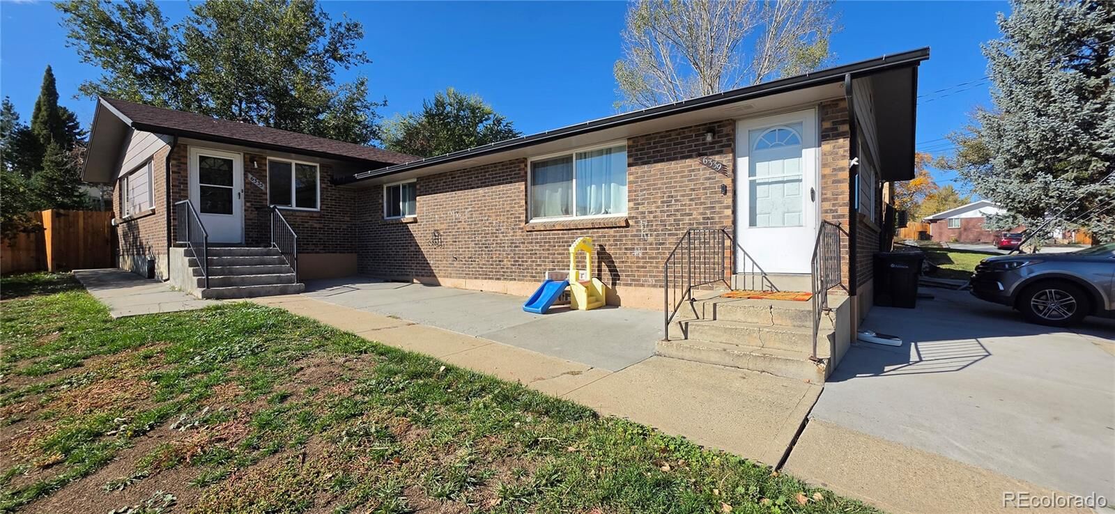 Property Photo:  6335 Dudley Street 6339  CO 80004 